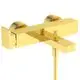 Goldene Badearmatur von Ideal Standard mit zwei runden Griffen und einem zentralen Auslauf. Schlichte, rechteckige Form ohne sichtbare Markierungen.